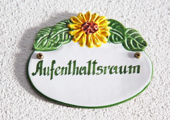 Schild zum Aufenthaltsraum